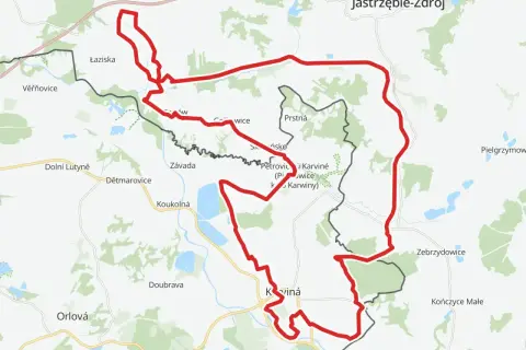 Mapa z zaznaczonym na czerwono żelazny szlak rowerowy, prowadzący przez tereny Czech i Polski, w okolicach Karwiny i Jastrzębia-Zdroju.