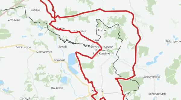 Mapa z zaznaczonym na czerwono żelazny szlak rowerowy, prowadzący przez tereny Czech i Polski, w okolicach Karwiny i Jastrzębia-Zdroju.