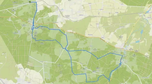 Mapa z zaznaczoną trasą rowerową wokół Olsztyna, prowadzącą przez lasy i wsie.